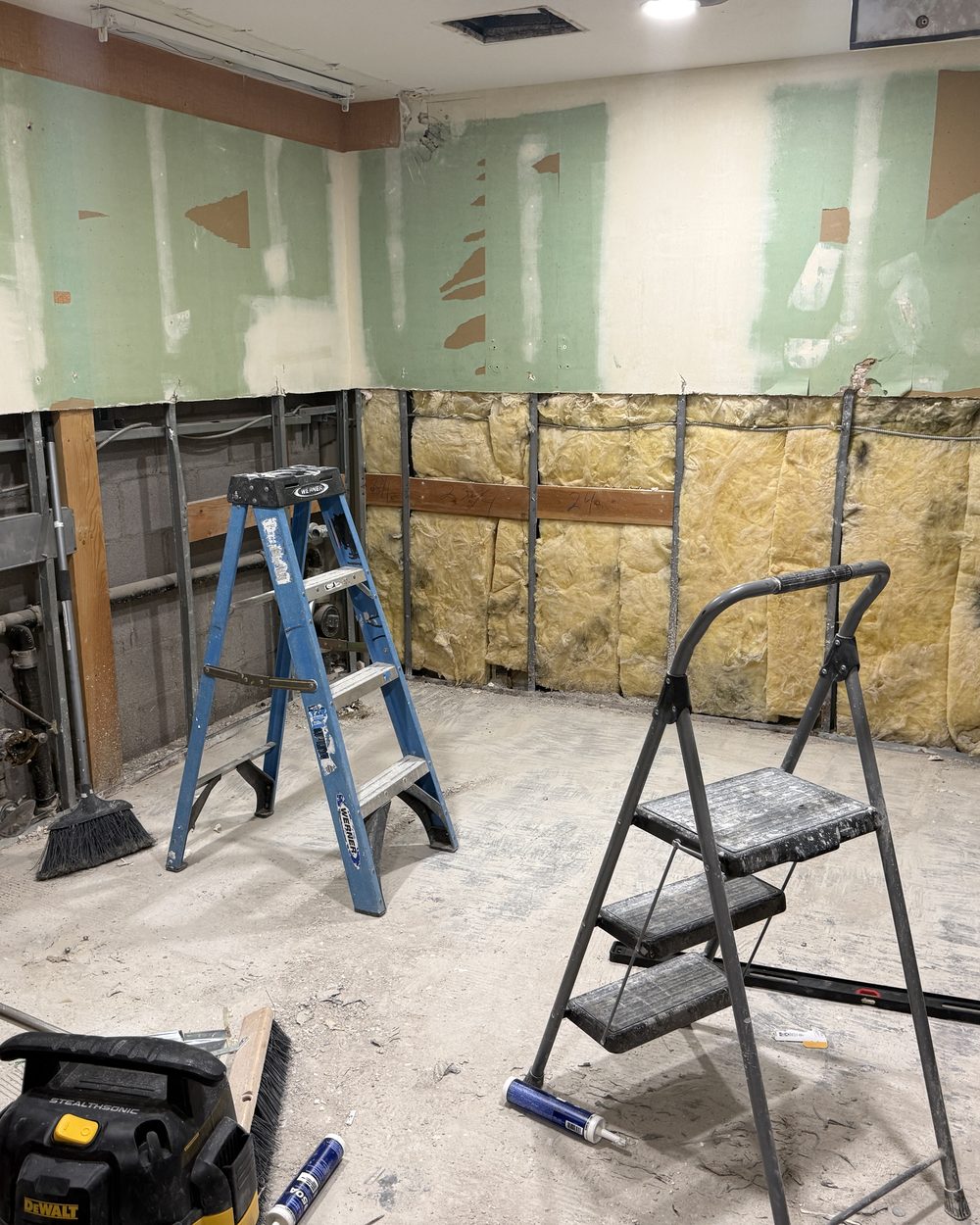 Interior demolition and framing during a Straten managed renovation
