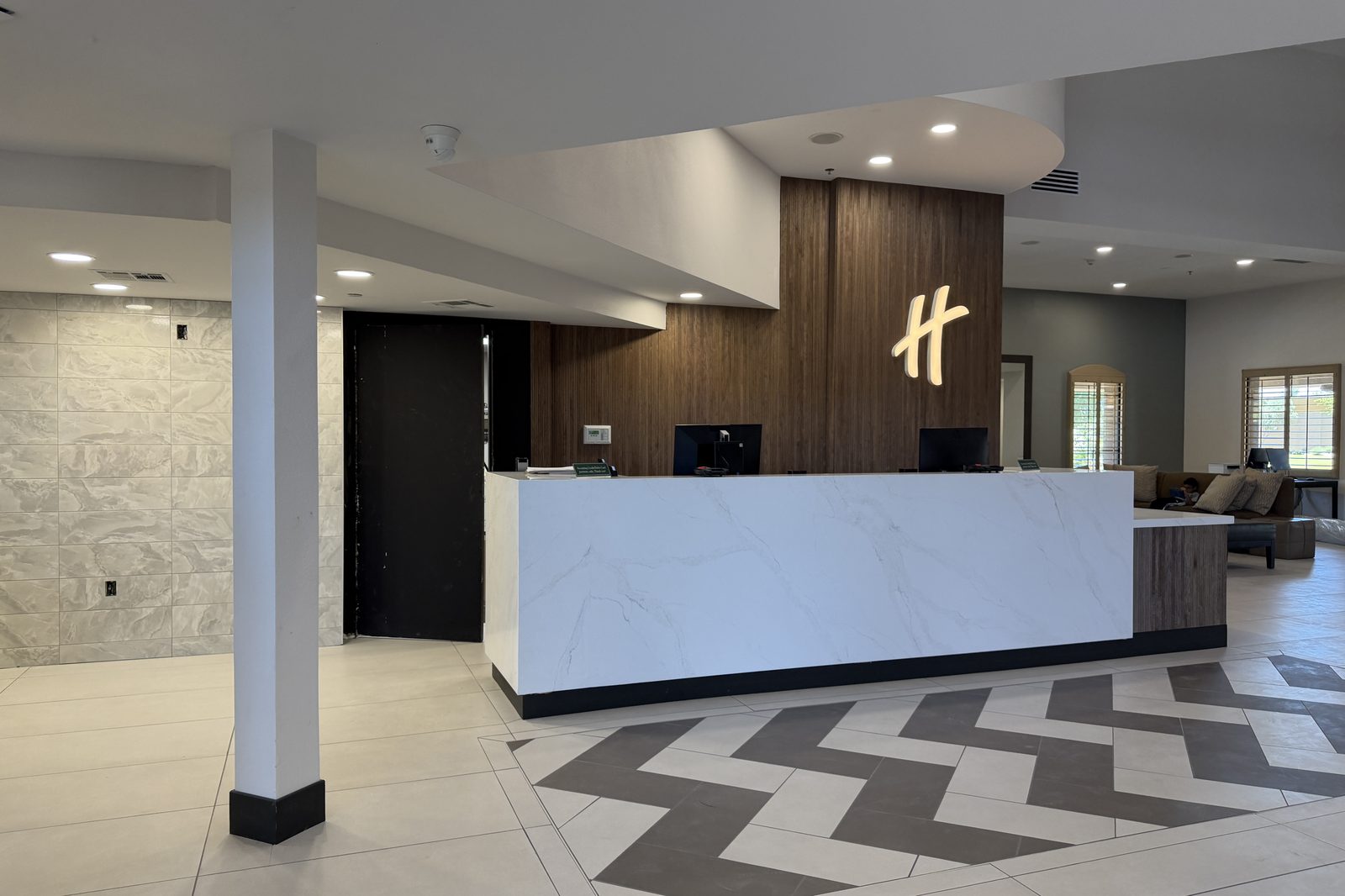 Completed hotel lobby and front desk after renovation