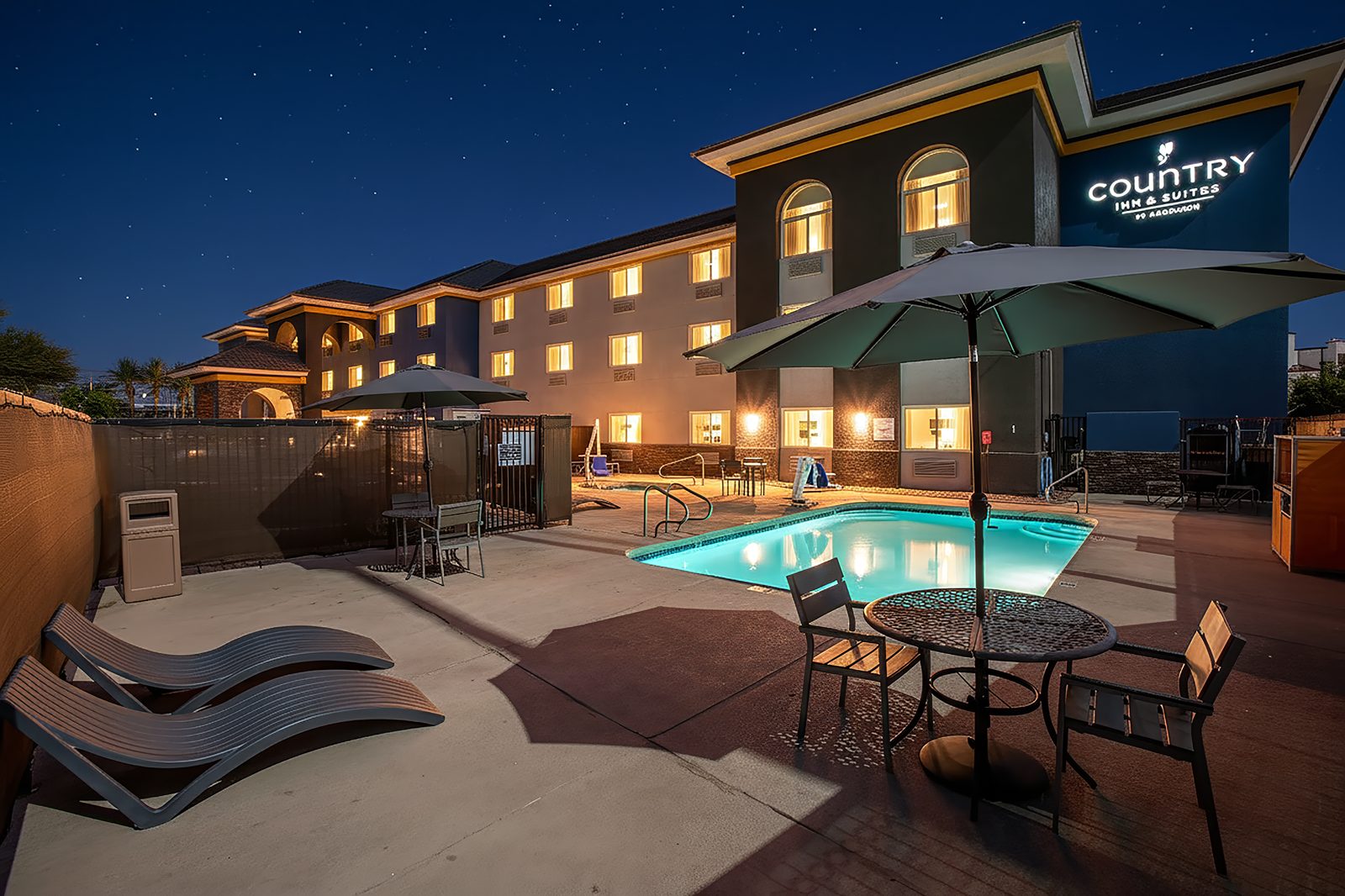 Pool courtyard at a Straten managed hotel in the evening